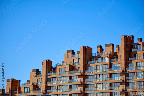 Modern Building With Irregular Roof over Blue Sky