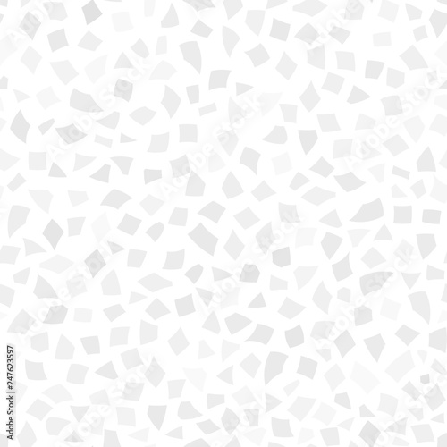Abstract seamless pattern of small pieces of paper or splinters of ceramics of different sizes in white and gray colors