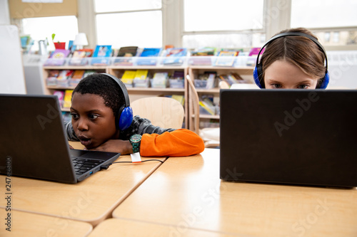 Students working on laptop computers