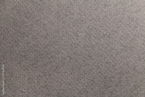 beige surface with a paper texture
