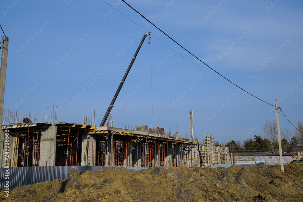 Construction of a residential building, reinforced concrete structures