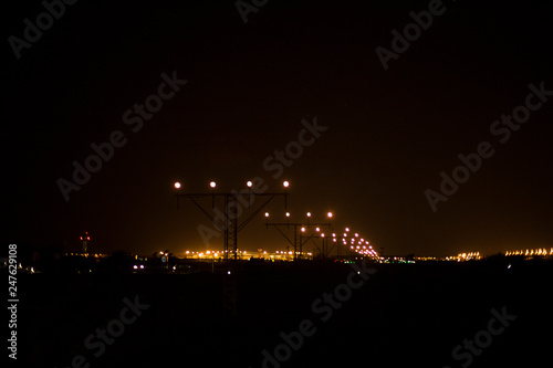 Landing runway lights of El Prat airport in Barcelona at night