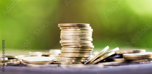 Web banner of money coins - financial freedom concept