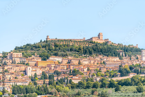 Town or village city of Assisi in Umbria, Italy cityscape of church during sunny summer day farm rural landscape Etruscan countryside hdr