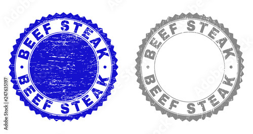 Grunge BEEF STEAK stamp seals isolated on a white background. Rosette seals with grunge texture in blue and grey colors. Vector rubber imitation of BEEF STEAK title inside round rosette.
