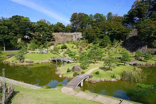 View of the Kenroku-en gardens near Kanazawa Castle (Kanazawa-jo),  a landmark  located in Kanazawa, Ishikawa, Japan  photo