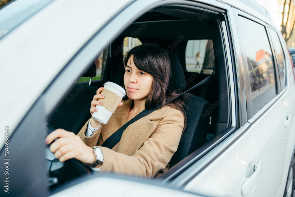 woman driving car. safety belt