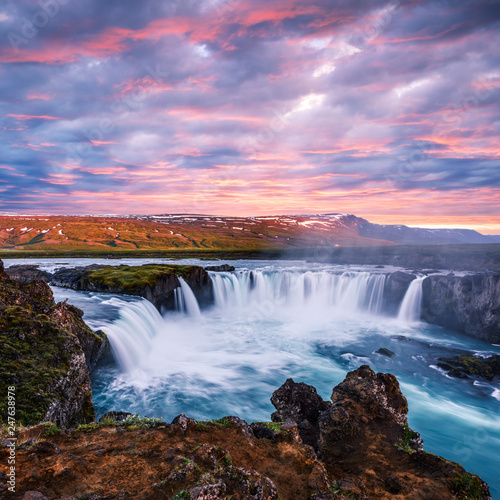 Colorful sunrise on Godafoss waterfall on Skjalfandafljot river  Iceland