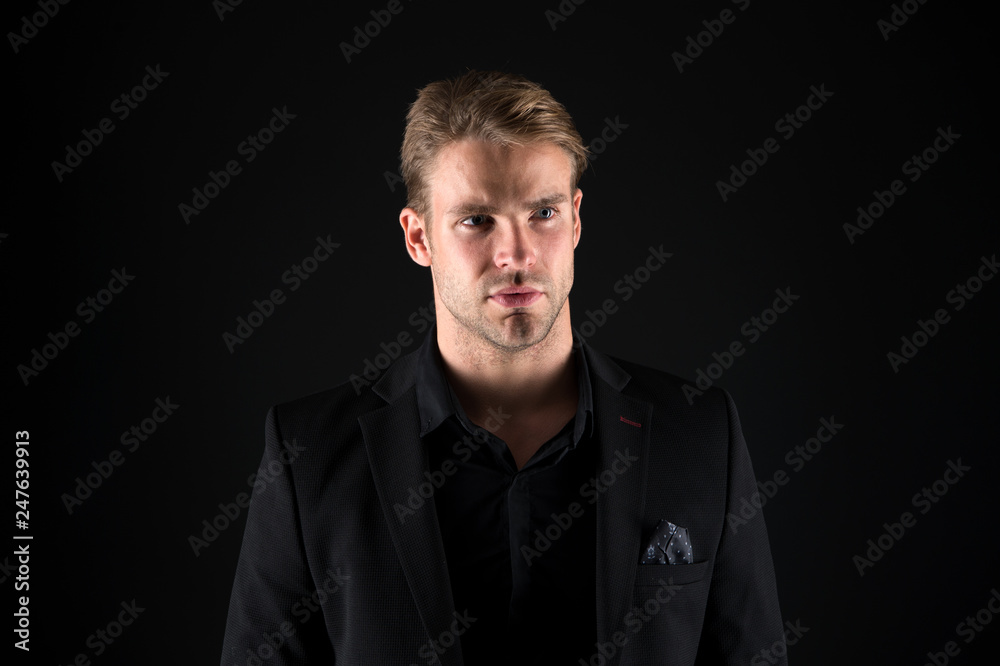 Man handsome well groomed macho on black background. Feeling confident. Male beauty and masculinity. Guy attractive confident model. Confident in his style. Man in dark clothes. Casually handsome