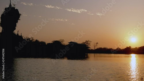 Swamp temple sunset time laps photo