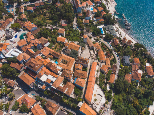 overhead view of old european city on the seaside © phpetrunina14