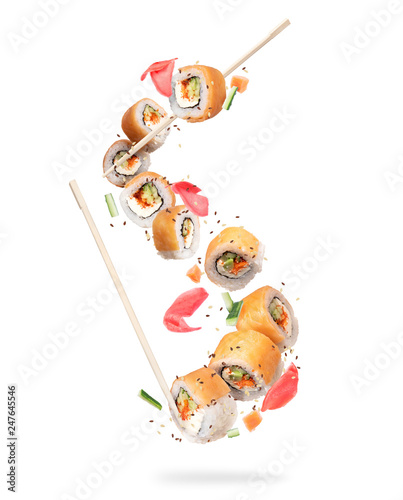 Fresh sushi rolls with salmon pieces in high resolution on white background