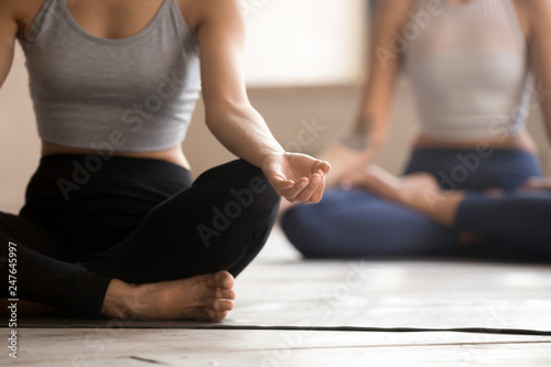 Close up of female yogi practice in lotus position