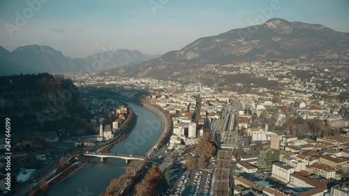 Aerial view of city of Trento, the Adige river and the Alps, Italy photo