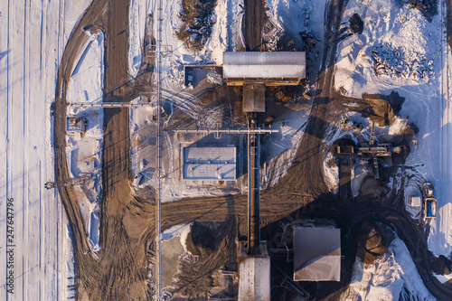 Aerial view over the sandpit. Industrial place in Poland. Photo captured with drone.