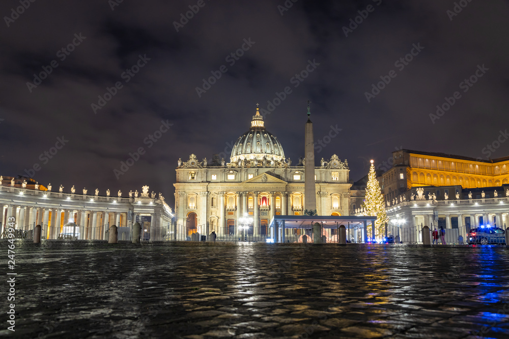 Saint Peter's square (Piazza San Pietro) in Vatican at night, center of Rome, Italy