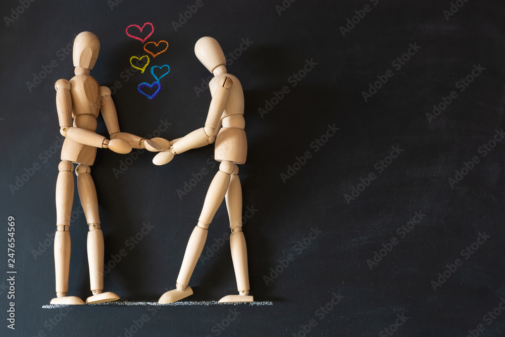 Couple in love and hearts against the background of chalk board with copy space Couple in love and hearts against the background of chalk board with copy space