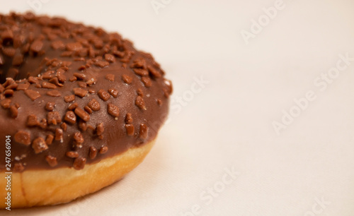 chocolate donut on a white background close-up