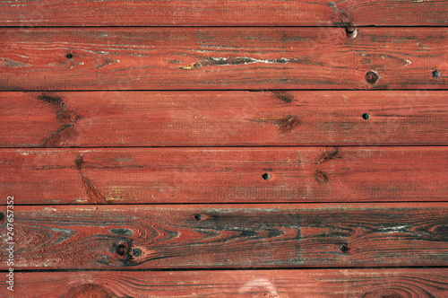 Background. A wooden surface painted in red and brown. Daylight shooting