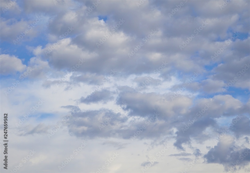 Amazing altocumulus clouds on clear blue sky, Winter in GA USA.