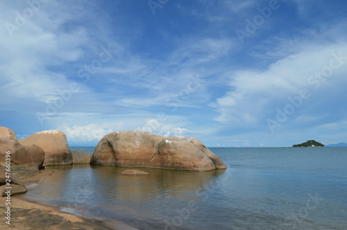 An African great lake surrounded by stones in Malawi