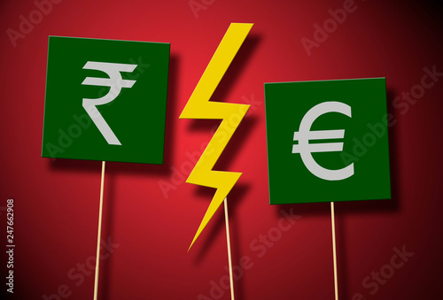 rupee vs euro symbols with a conflict thunder on little banners with stick photo