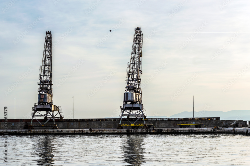 Old cargo cranes in port of Rijeka, Croatia, Old cargo cranes in port of Rijeka, Croatia,