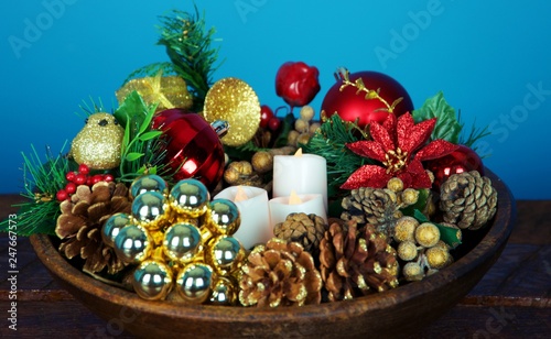Wood bowl filled with winter, Christmas items 