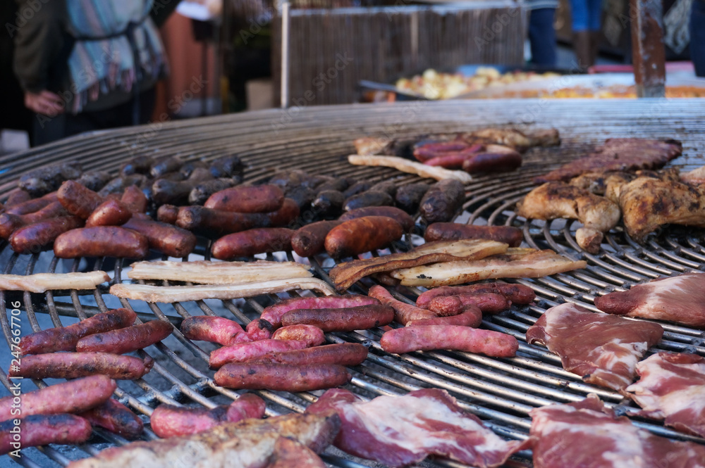 Meat on grill on street market