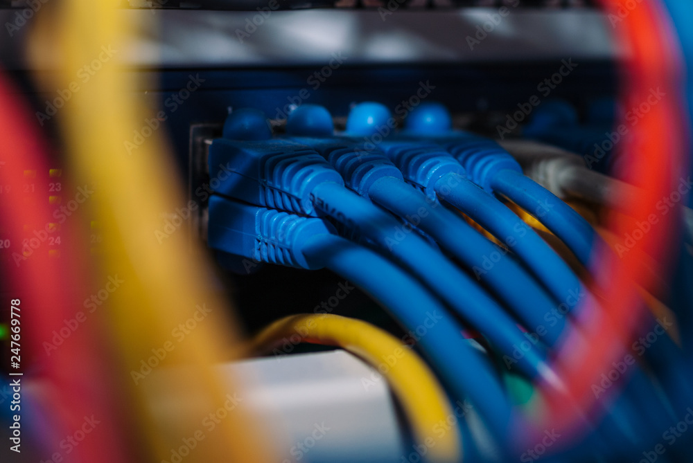 Close up of ethernet network cable with switch Close up of ethernet network cable with switch