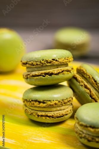 Fototapeta Naklejka Na Ścianę i Meble -  Lime and Mint Flavored Green Macaron. Selective focus.