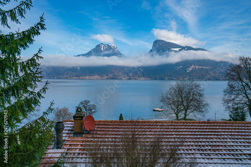 Window view of the lake Thun in winter, in Switzerland photo