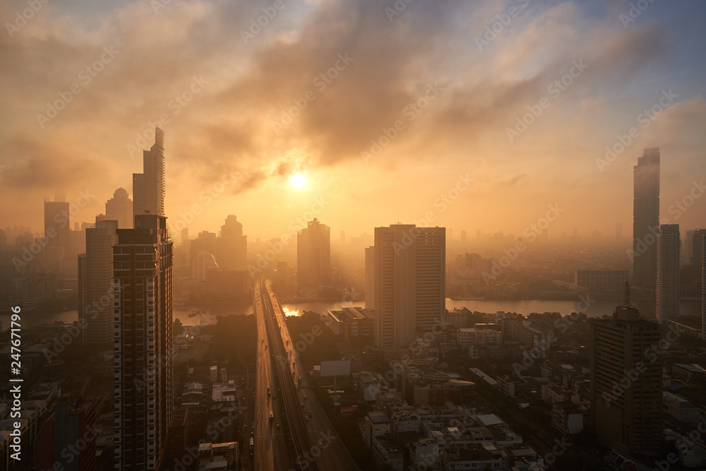 perfect sunrise skyline with cityscape and bridge cross the river