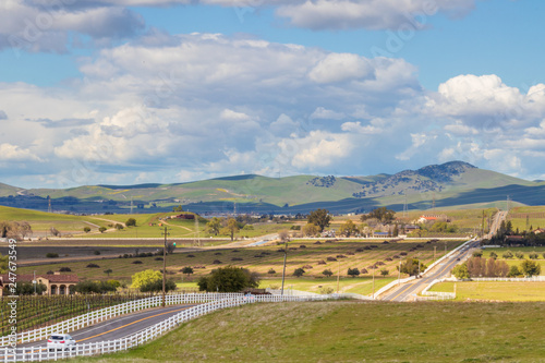 Rolling hills and clouds landscape near livermore California with vineyards photo
