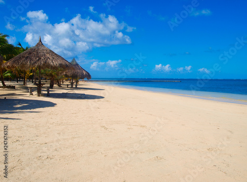 Caribbean beach with umbrellas