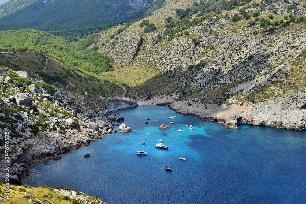 Beautiful sea bay with turquoise water, beach and mountains, Cala Figuera on Cap Formentor, Mallorca