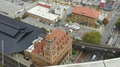 Zooming down over Richmond's iconic landmark Clock Tower as well its nearby highway. photo