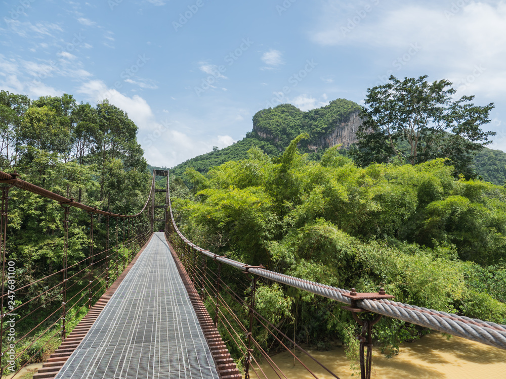 Hanging bridge cross over river in Thailand