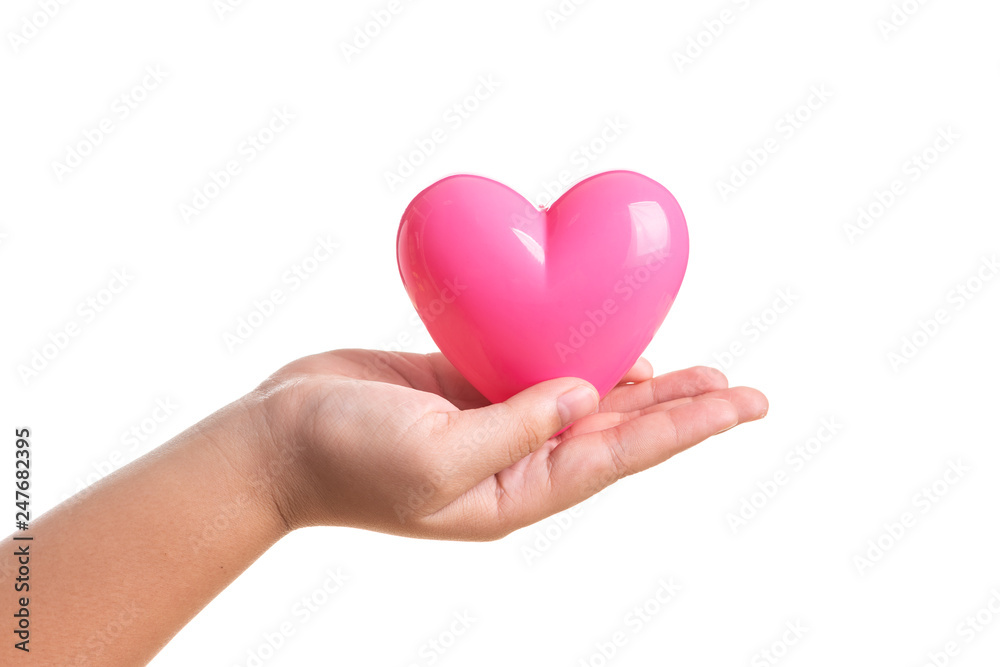 Pink heart on kid hand isolated on white Pink heart on kid hand isolated on white
