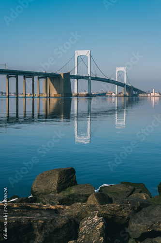 Throgs Neck Bridge with clear reflection in water photo