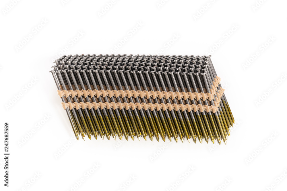 Nail gun nails used in a framing nail gun isolated on a white background. Nail gun nails used in a framing nail gun isolated on a white background.