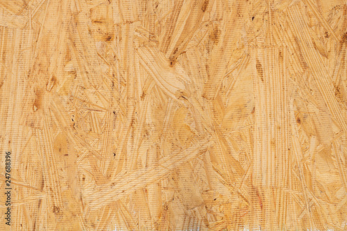 Fototapeta Naklejka Na Ścianę i Meble -  Close up of sub flooring board made of wood chips background