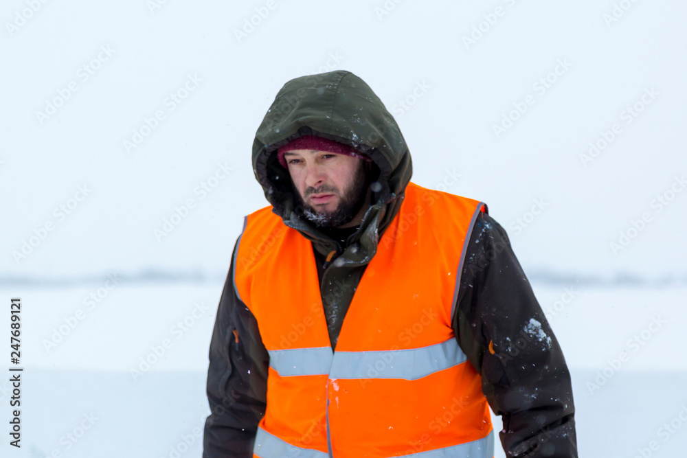 Portrait of installer in orange reflective vest Portrait of installer in orange reflective vest