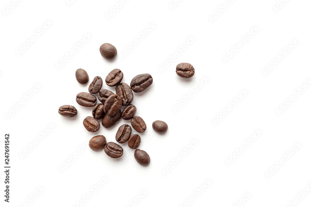 Coffee beans isolated on white background. Close-up. Coffee beans isolated on white background. Close-up.