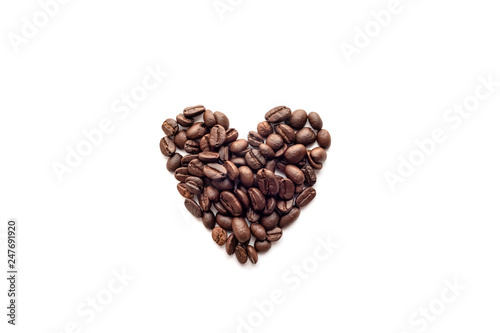 Heart shape of roasted coffee beans isolated on a white background.