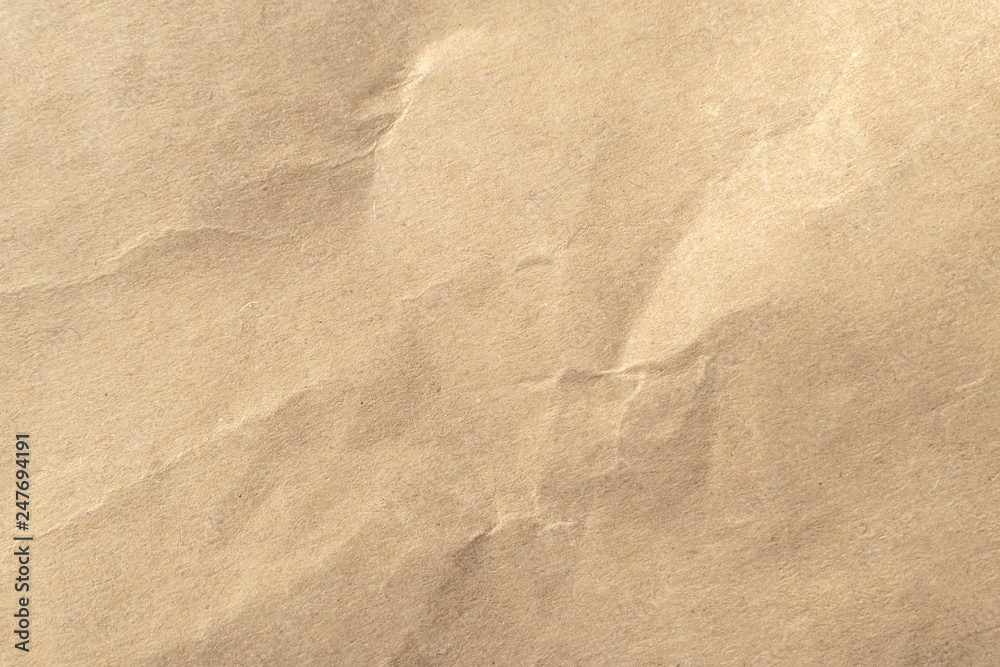 Brown crumpled paper texture background.