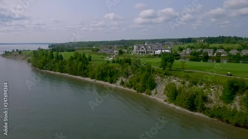 Aerial footage of a venue overlooking a lake. photo