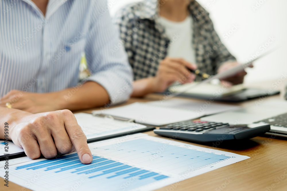 Business people working analysis graph on desk at meeting room, Corporate Communication Teamwork Concept. Business people working analysis graph on desk at meeting room, Corporate Communication Teamwork Concept.