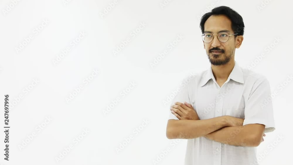 Asian businessmen are standing, arms crossed, studio shot on white background. Asian businessmen are standing, arms crossed, studio shot on white background.