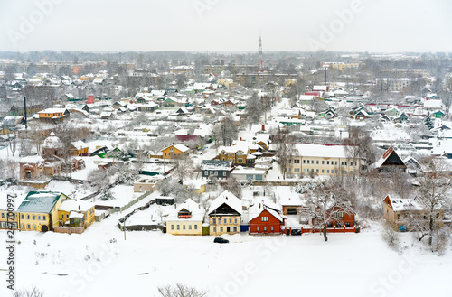 A winter view of the small old town in Russia with medieval churches  monastery  old-fashione houses 